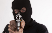 The robbers bolted with the money after shooting the husband and wife [File photo]