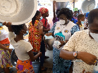 NCC head during an educational programme at Madina market in Accra