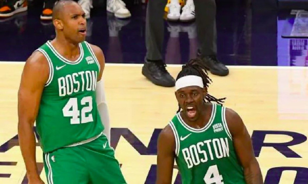 Al Horford and Jrue Holiday celebrate Boston's victory