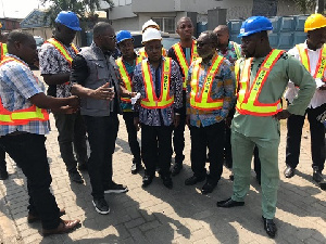 Health Minister being surrounded by some staff of Tema Port and LCB World Wide Ghana