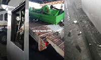 the damaged toll booths and the trailer showing the tractor buckets