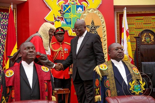 President Nana Addo Dankwa Akufo-Addo shaking hands with Justice Atuguba, Acting Chief Justice