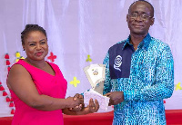 Naa Atwei Oduro receiving her award