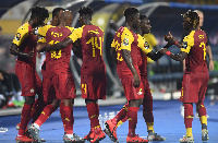 Black Stars players celebrating a goal