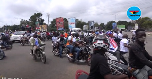 Hundreds of gleeful motorbike riders gleefully swamed the Vice President's motorcade