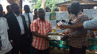 Director of the NGO, Apostle Michael Ankrah making the donation