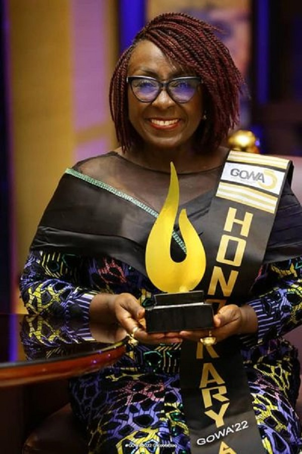 Dzifa Gomashie with her award