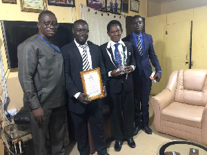 Eng. Dr. Ebenezer Ankomah Gyamera [L] and Ps John Dadzie [2nd R] together with some pastors