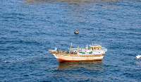 Migrants on a boat off the Libyan coast (file image)