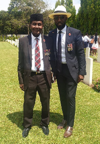 Derrick Cobbinah, ex-British soldier poses with Ghanaian world war veteran