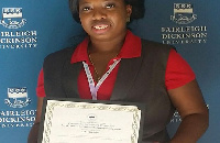 Vida Ofei-Addo displaying her certificate