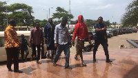 The suspects entering the court premises