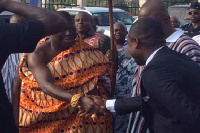 Otumfuo in handshake with Abeiku Santana