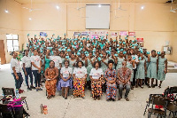 Students displaying the pads they received from the NGO