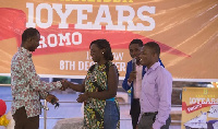 Denise Asare, Marketing Manager for Accra Mall receiving the prize on behalf of the winner