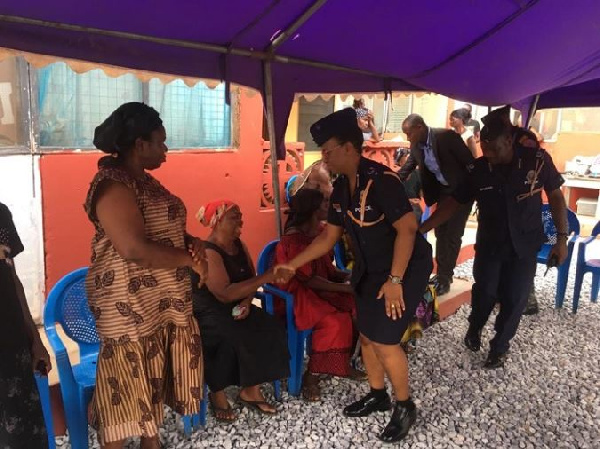 Police Officers sharing their condolences with family of their deceased colleague