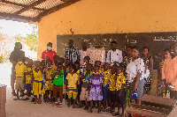 Dennis Appiah Larbi [white] with the students