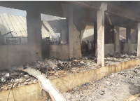 The fire destroyed five rooms and displaced 215 students