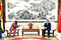 Lu Kun, the Chinese Ambassador to Ghana with George Boakye, the Ahafo Regional Minister