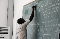 A Teacher teaching in the classroom