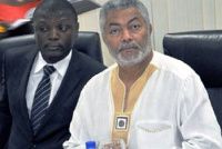 MP Kofi Adams with late JJ Rawlings