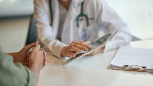 File Photo: A doctor interacting with patient