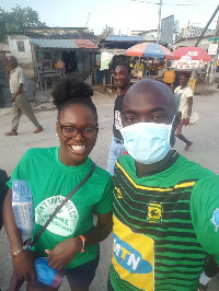 Kennedy poses with a female volunteer during the exercise