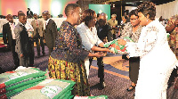 First Lady Auxillia Mnangagwa handing over traditional seed to the wife of Chief Nechombo (Mrs Rufar