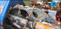 The flood dragged a taxi parked nearby to crash the shop destroying goods in it