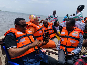 Elvis Afriyie-Ankrah and other crew members on the boat