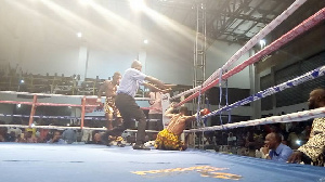 Isaac Sackey on the ground after receiving Wasiru Mohammed's heavy punch