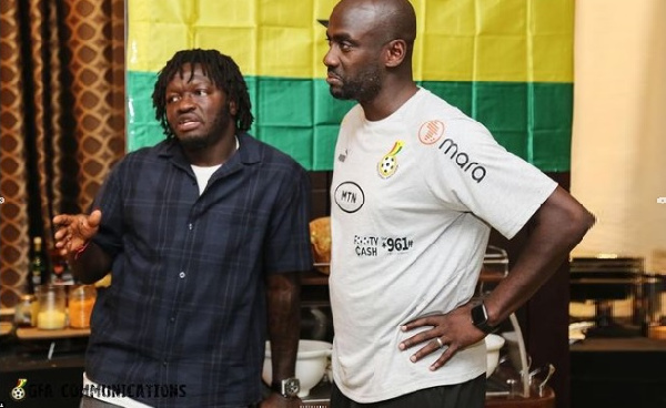 Sulley Muntari with Otto Addo