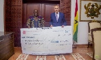 President Nana Akufo-Addo receiving the donation