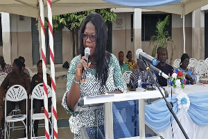 Headmistress of the school, Mrs Evelyn Amoamah Antwi delivering her speech