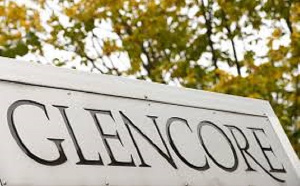 The logo of commodities trader Glencore is pictured in front of the company's headquarters in Baar,