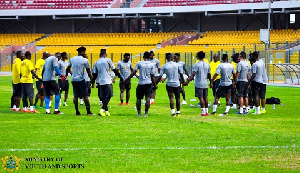 Players praying before the training session