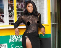 Efia Odo wore a black see-through dress to Kwesi Arthur's event