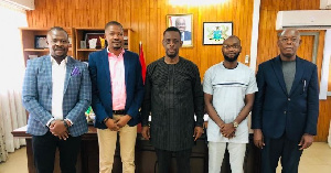 Western Regional Minister, Kwabena Okyere Darko-Mensah (M) and the organisers of the initiative