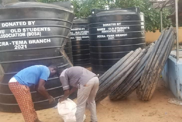 Some of the polytanks and pipes donated to the school