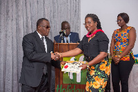 Madam Afua Asabea Asare receiving the award