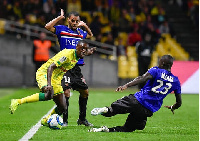 Ghana international Dennis Appiah(middle)