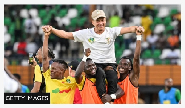 Benin coach Gernot Rohr was carried onto the pitch by his players after their famous win over Nigeri