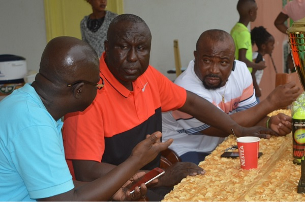 Roberts Tetteh, in the middle is President of 4 Garrison S.S Abebe and DCOP Kwasi Doku