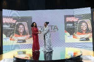 CEO of Vodafone Ghana, Patricia Obo-Nai [L] receiving the award