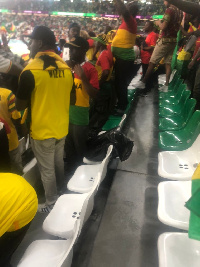 Ghanaians fans at the Education City Stadium cleaned up after the game