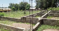 The abandoned six-unit classroom block at Denase