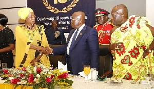 President Akufo-Addo shaking hands with Sophia Akuffo, Chief Justice