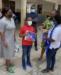 Nine-year-old Oswald received an iPad from Prof. Jane Naana Opoku