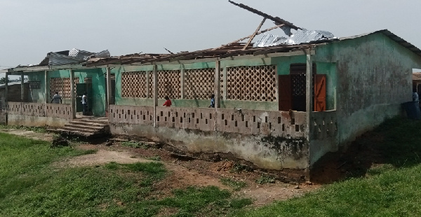 A photo of the three-unit classroom block that had their roofs ripped