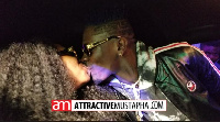 Shatta Wale kissing his wife Shatta Michy after receiving his new car